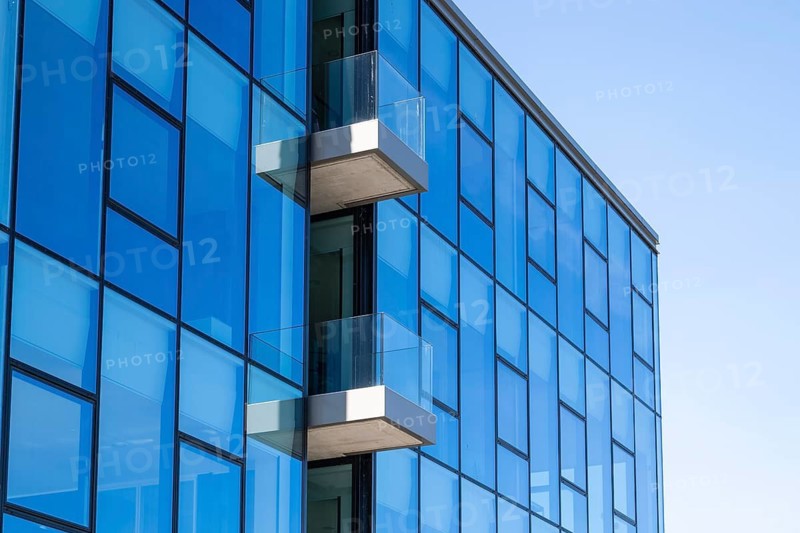 Modern commercial building on Lake Phoenix, glass façade with balconies, detail, Hörde, Dortmund, Ruhr area, North Rhine-Westphalia, Germany