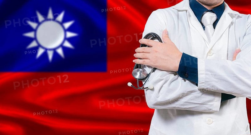 Taiwanese national health system, Medical professional holding sthetoscope isolated