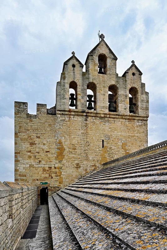 Bell tower of the Notre-Dame-de-la-Mer Roman Catholic Church, Saintes-Maries-de-la-Mer, Camargue, southern France, France