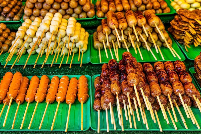 BBQ skewers with Thai specialties at a stand below the Wat Phra That Doi Suthep temple complex, Chiang Mai, Thailand