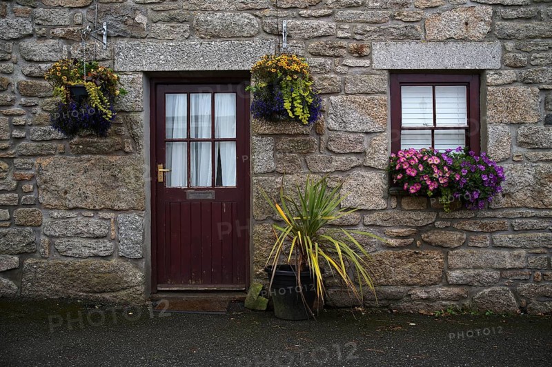Façade with flower boxes and hanging baskets, residential building, St Just in Penwith, Cornwall, England, Great Britain, Great Britain