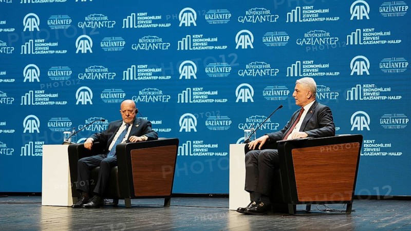 GAZIANTEP, TURKEY - JUNE 9, 2026: Turkish Minister of Trade Omer Bolat and Syrian Minister of Economy and Industry Mohammad Nidal al-Shaar participate in a panel discussion during the Anadolu City Economies Summit held in Gaziantep. The high-level event focuses on strengthening bilateral relations, cross-border trade, economic cooperation, and the reconstruction of Syria, Gaziantep, Turkey