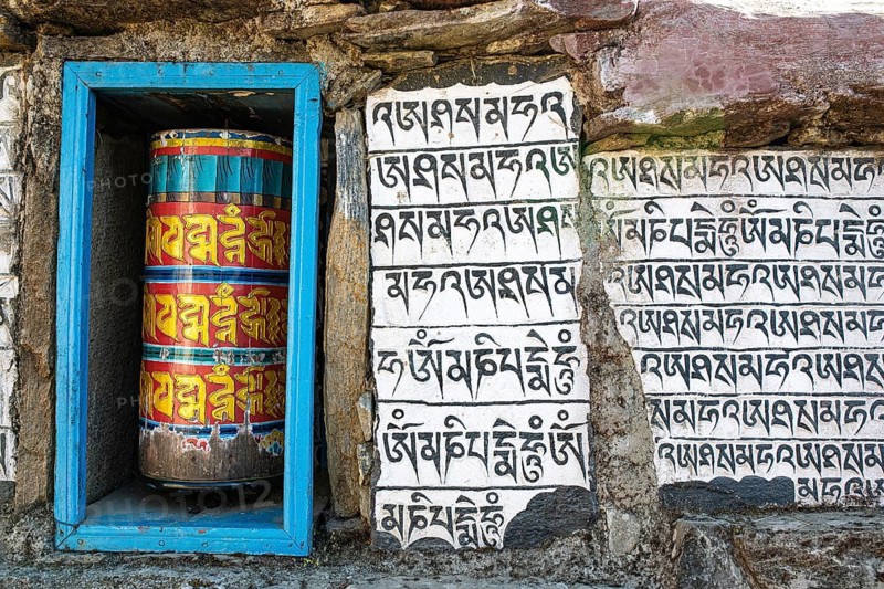 Buddhist prayer wheel and holy mantras at Lukla, path to Mount Everest, Solu Khumbu, Himalayas, Nepal