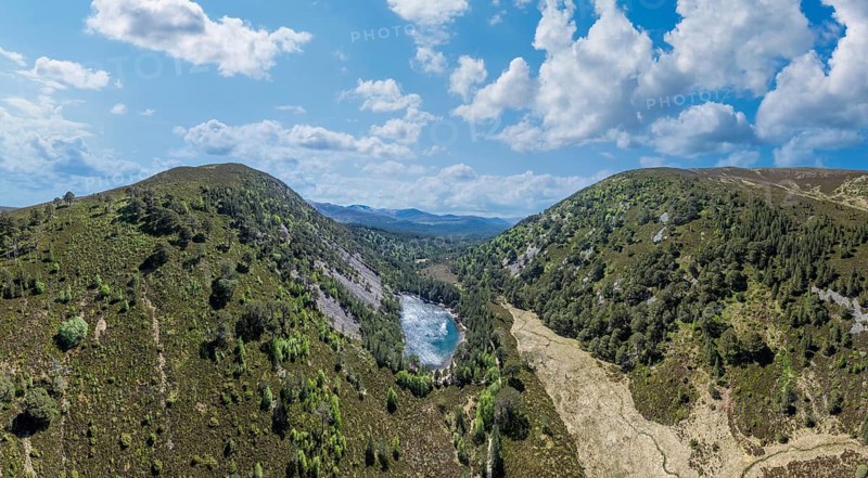 Panoramic aerial photo of the Glenmore Forest park, part of Cairn Gorms Nationalpark, Aviemore, Scotland, United Kingdom