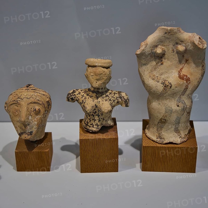 Three ancient ceramic figures from Phylakopi exhibited on wooden bases in a museum, Plaka Archaeological Museum, Plaka, capital on Milos, island of Milos, volcanic island, Cyclades, Greek islands, Greece