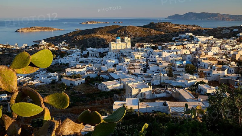 Church, Panagia Odigitria, A panoramic view of a coastal area with white Greek houses and surrounding vegetation, main town on Kimolos, Kimolos, Chorio, Kimolos island, neighboring island of Milos, Cyclades, Greek islands, Greece