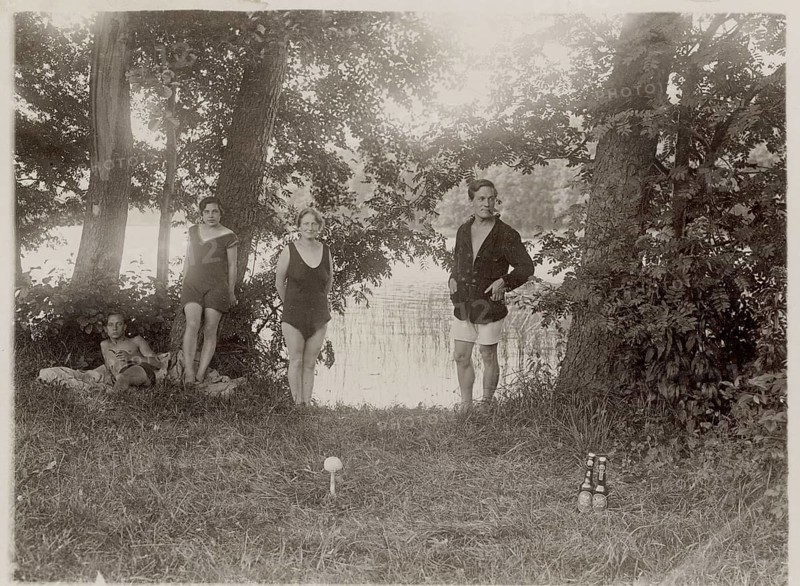 Bathing, swimwear, woman, men, leisure, fun, summer, lake, adults in bathing suits relaxing on the wooded lakeside, around 1926
