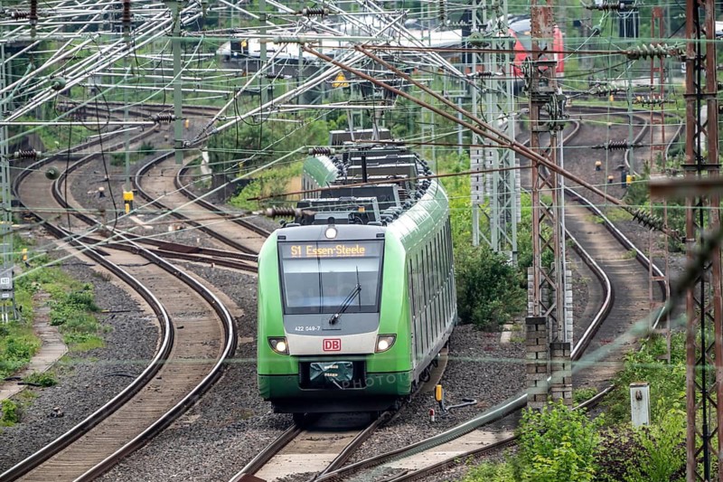 S-Bahn S1 on the line near Mülheim-Styrum, railway line between Mülheim an der Ruhr and Duisburg, busy railway line, for local and long-distance traffic, freight traffic, North Rhine-Westphalia, Germany