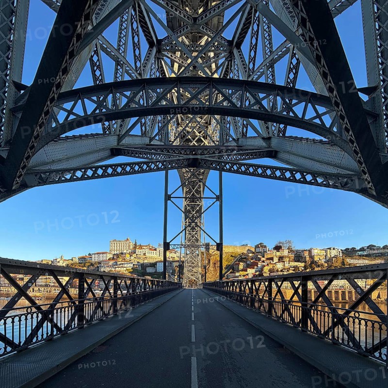 Ponte Dom Luis I arched bridge designed by Théophile Seyrig, viewed from the lower level towards Porto, Portugal