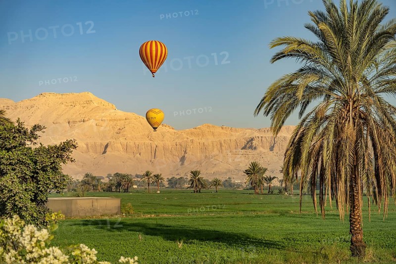 Hot air balloons with tourists over ancient Thebes near Luxor, Egypt