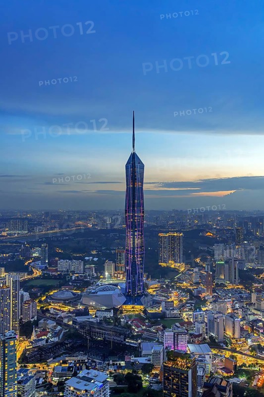Merdeka 118, Merdeka Tower, neo-futuristic megatall skyscraper illuminated in the evening in capital city Kuala Lumpur, tallest building in Malaysia