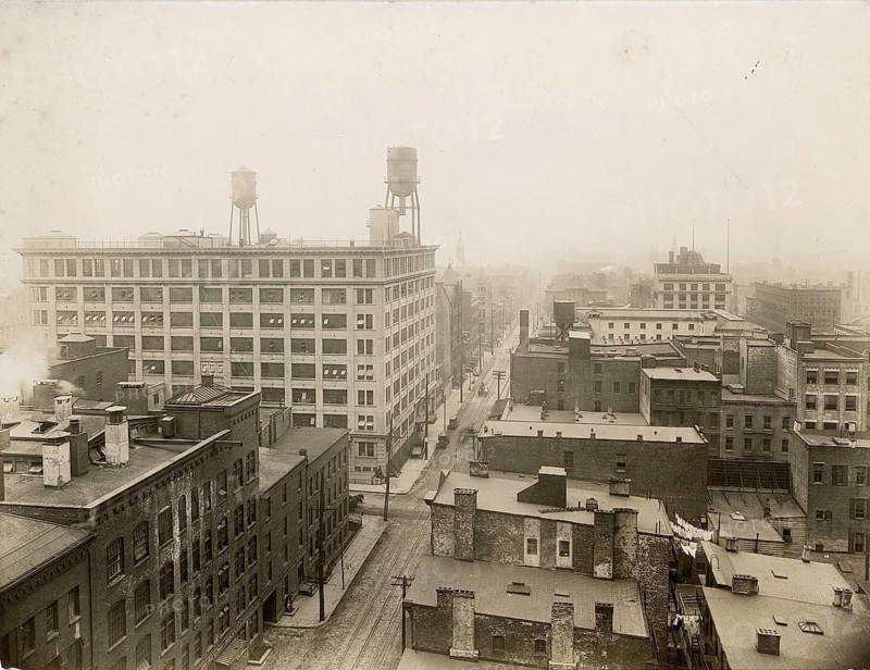 Chicago, USA, perfume manufactures, panorama, industry, view over a foggy city with water towers on the roofs, 1910
