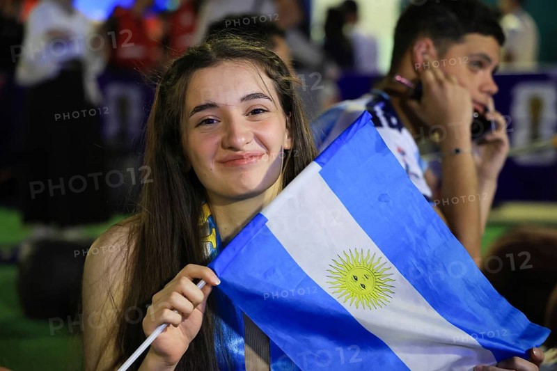 Damascus, Syria - July 19, 2026: Argentina supporters express despair as they react to their team's defeat immediately following the conclusion of the 2026 FIFA World Cup final match against Spain during a public viewing event in Damascus, Damascus, Damascus, Syria
