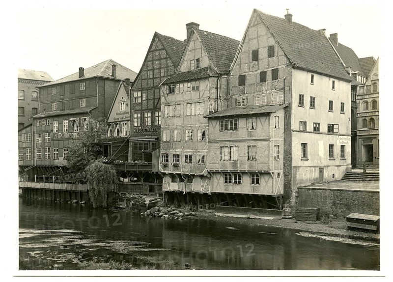 Lüneburg, half-timbered houses, Ilmenau, Middle Ages, A series of old half-timbered houses stand along a river, around 1920
