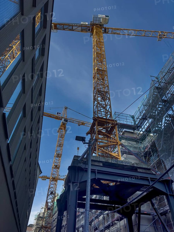 Scaffolding, equipped house, yellow crane, Munich, Bavaria, Germany