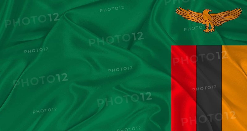 Zambian flag with fabric texture. Realistic flag of Zambia waving, National flag