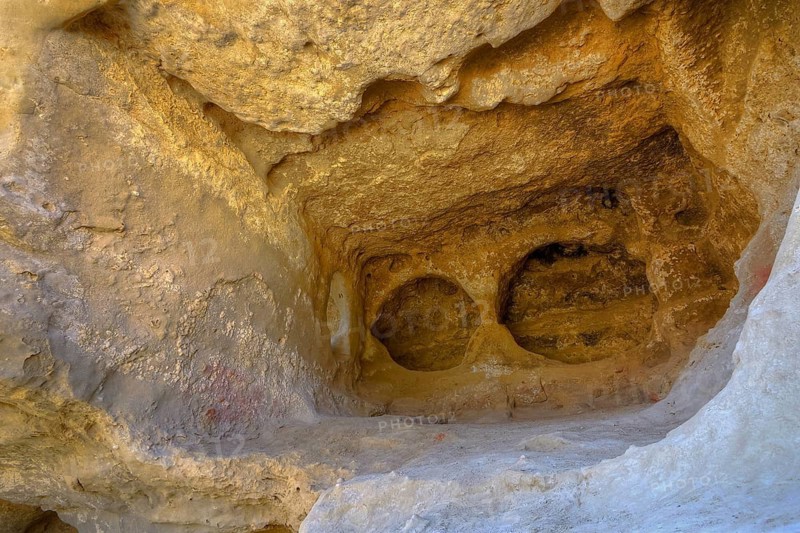 Neolithic caves, former hippie paradise, interior view of an eroded cave with natural, irregular rock structures, Matala, south coast, Crete, Greek Islands, Greece