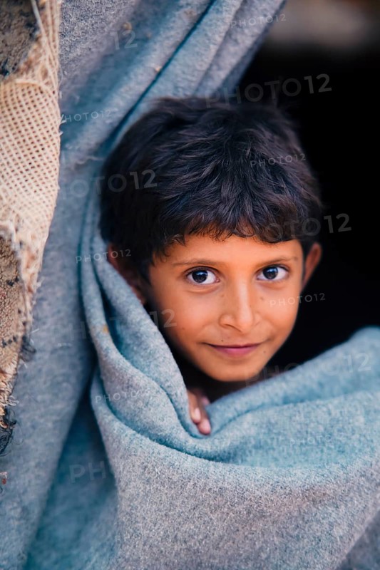 Yemeni children living in a refugee camp under difficult humanitarian conditions. Yemen, April 12, 2024, Seiyun, Yemen