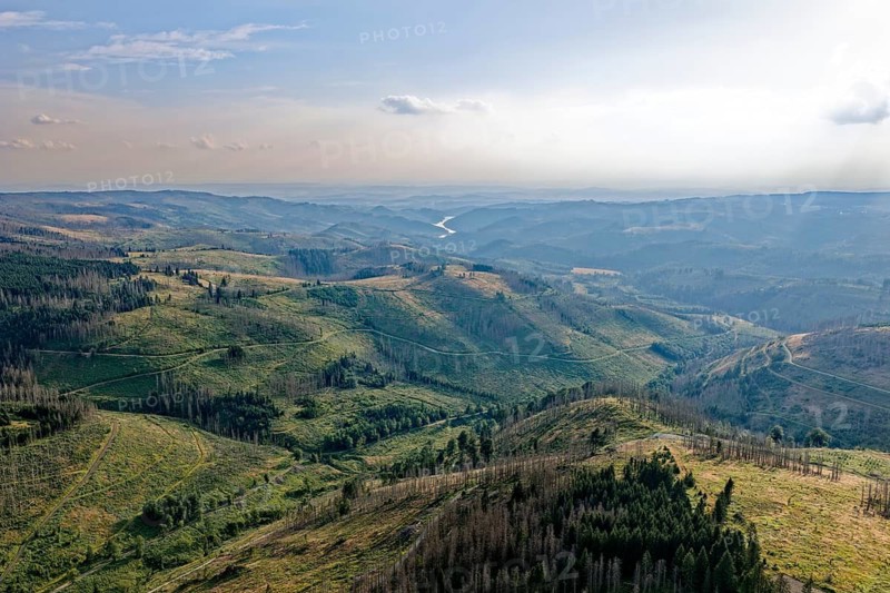 Mountain landscape in the Harz nature park Park, and in the distance the Sösestausee. aerial view. Harz, Landkreis Goslar, Lower Saxony, Germany