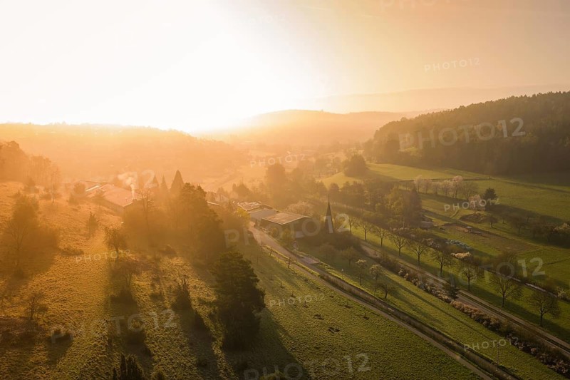 Extensive panorama of fields and forests in the soft light of sunset, Deufringen, Aidlingen, Heckengäu region, Böblingen district, Germany