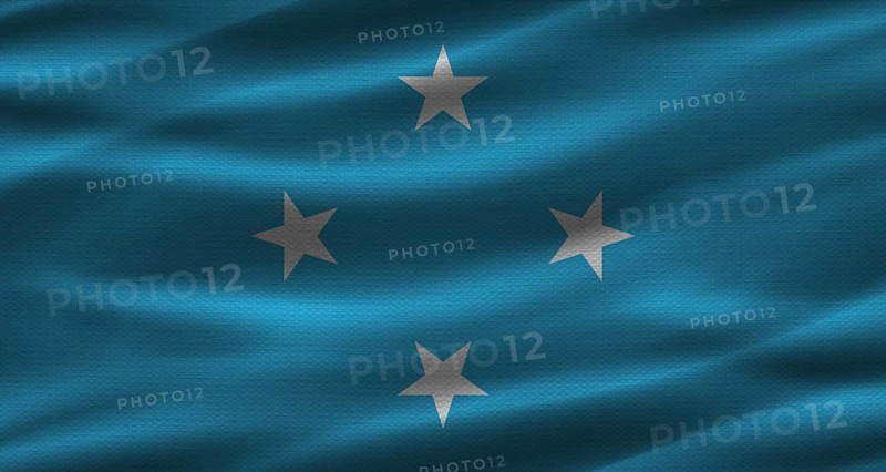 Micronesian flag with fabric texture. Realistic flag of Micronesia waving