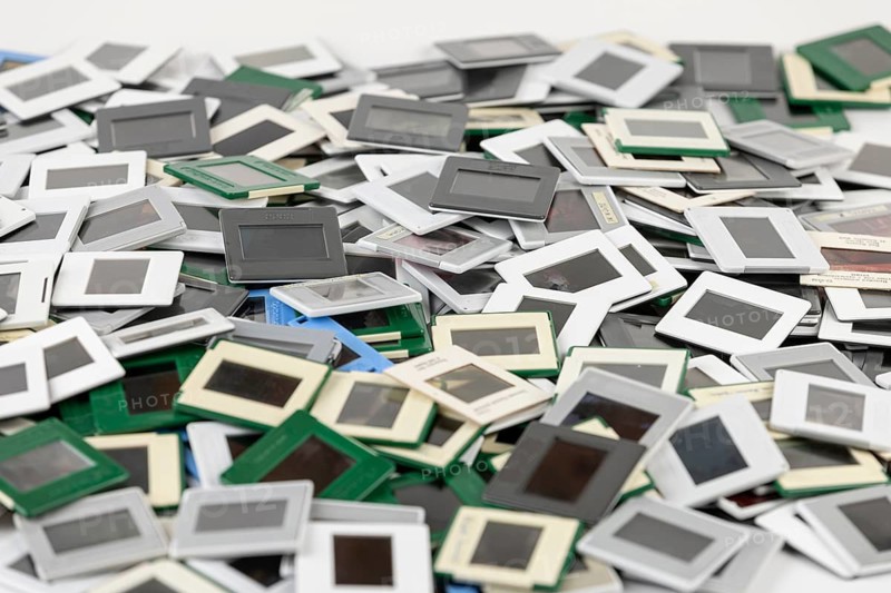 A disorderly pile of slides in different colors