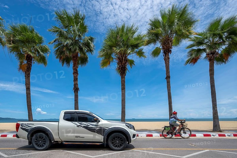 Jomtiensaineung Road Pick-up and Cyclist, Jomtien, Thailand