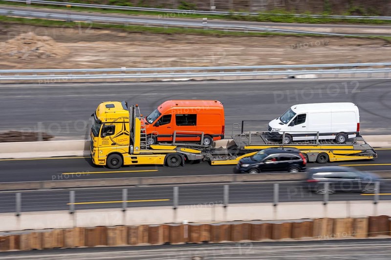 Car transporters, vehicles are being transported, A3 motorway, vans