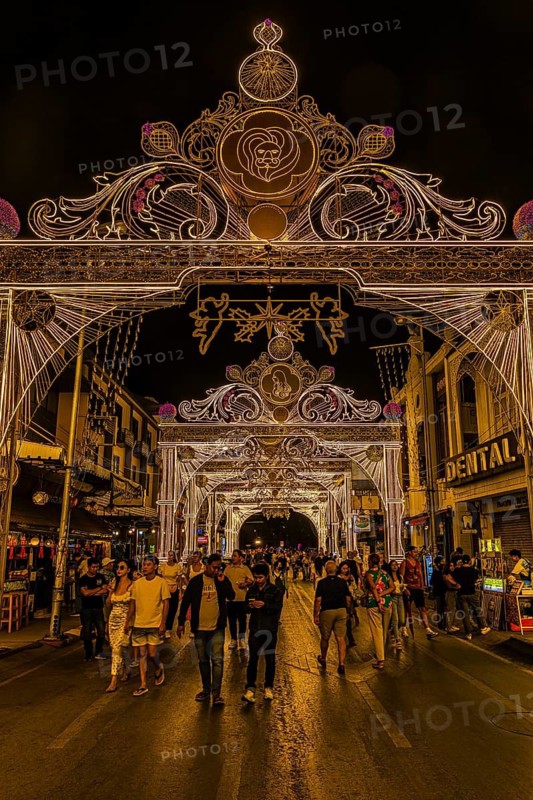 Large trains and luxurious street lighting in a pedestrian zone, night view, old city center, Chiang Mai, Thailand