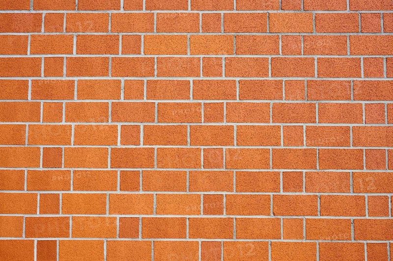 Orange brick wall with checkerboard pattern, Bavaria, Germany