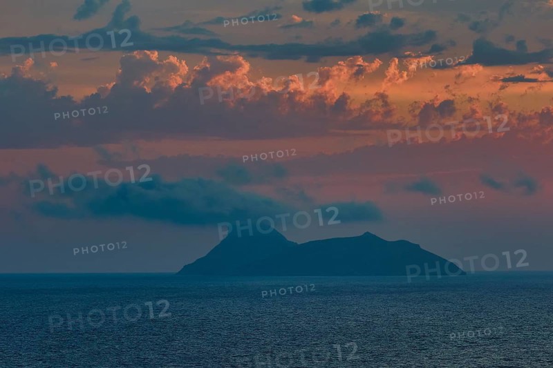 Paximadia island, island surrounded by clouds, dusk at sea, Matala, South Coast, Crete, Greek Islands, Greece