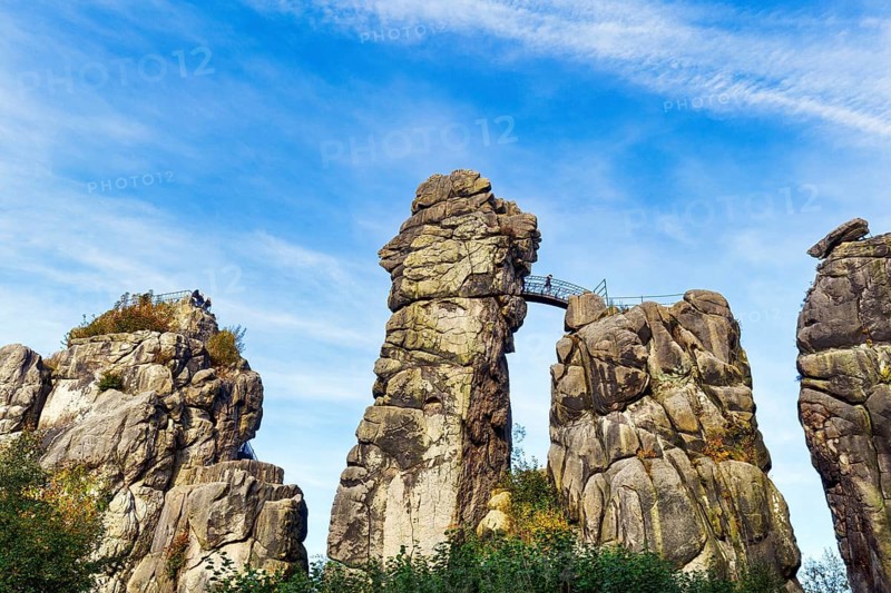 Cultural monument, Externsteine nature reserve, hikers on viewing platform, Horn-Bad Meinberg, Teutoburg Forest, North Rhine-Westphalia, Germany