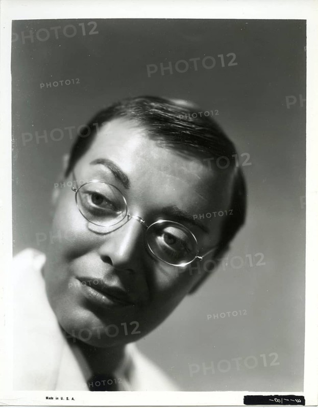Peter Lorre, Mr. Moto, actor, film actor, 1904.1964, Jewish, immigrant, Hollywood, film, fled Germany, close-up of a man wearing glasses in an artistic black and white portrait, around 1938