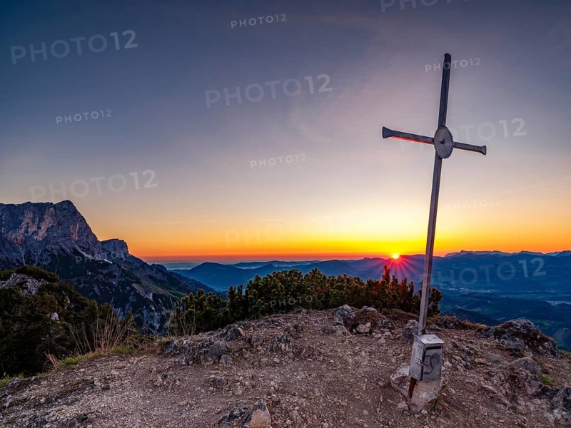 Sunrise at the summit cross of Rauhen Kopf, behind the Untersberg, Berchtesgaden Alps, Bischofswiesen, Berchtesgadener Land, Upper Bavaria, Bavaria, Germany