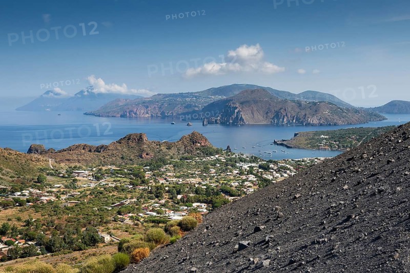 Houses, Vulcano harbour, Lipari and Salina in the background, Aeolian or Aeolian Islands, Sicily, Southern Italy, Italy