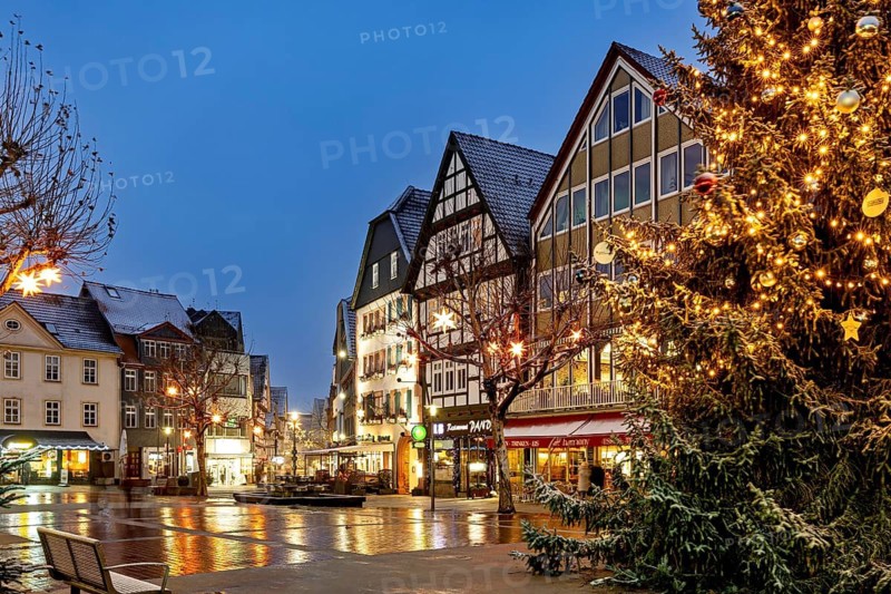 City view with illuminated Christmas tree and half-timbered houses in an evening atmosphere, view of the city center of Bad Hersfeld