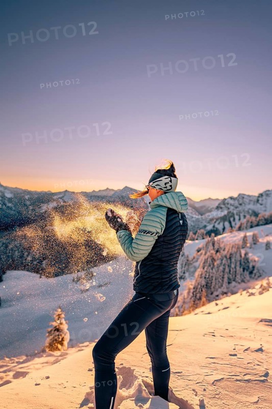 Summit bliss in the snow-covered winter landscape in the Tannheimer Tal in the Alps on the Neunerköpfle, Tyrol, Austria