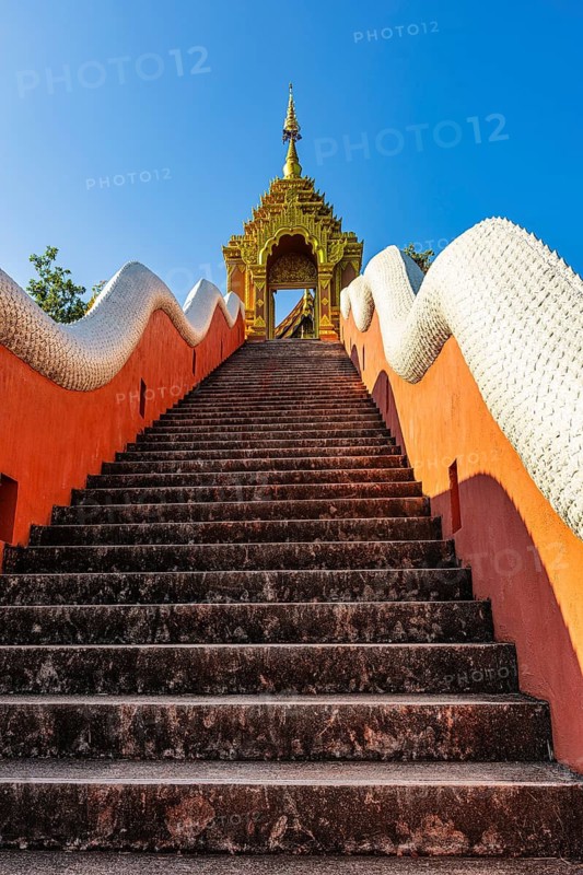Steep stairs lead up to the Buddhist temple Wat Phra That Don Phra Chan, near Lampang, Lampang Province, Thailand