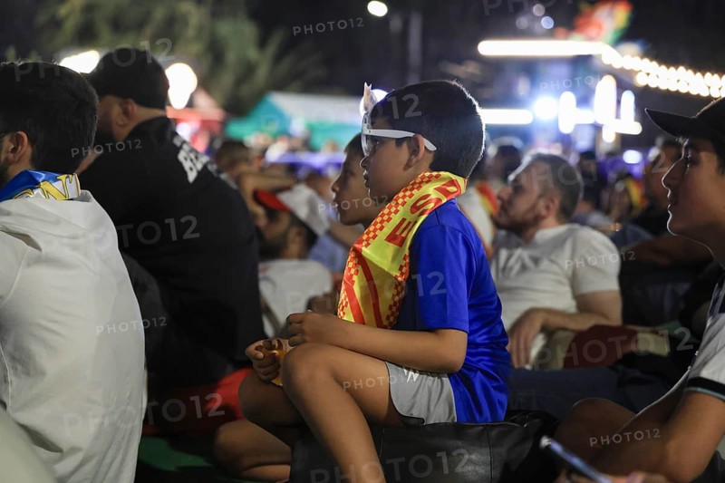 Damascus, syria - july 19, 2026: Supporters of the Spanish national football team erupt in celebration in Damascus following Spain's victorious 1-0 win against Argentina to claim the 2026 FIFA World Cup title, Damascus, Damascus, Syria
