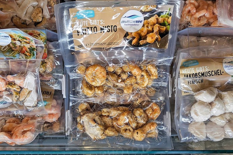 Dossenheim, Germany - April 7th 2026: Supermarket freezer shelf with Deutsche See Fischmanufaktur seafood products. Premium frozen selection with scallops, Fritto Misto and Frutti di Mare