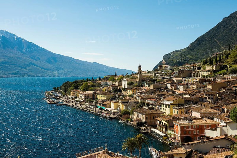 Picturesque village and colorful houses on the lake and steep mountains, Limone sul Garda, Lake Garda, Brescia province, Lombardy region, Italy