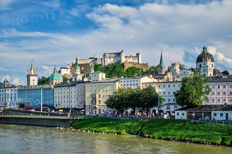 Stunning landscape of the Salzburg Old Town and the Salzach river with the Hohensalzburg Fortress during summer in Salzburg, Austria