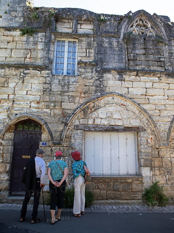 Elderly people at the oldest house in Brantôme, Dordogne department, Nouvelle-Aquitaine region, Périgueux arrondissement, Périgord Vert, France