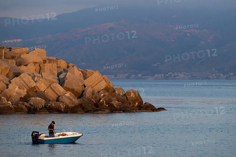 Fishing fisherman, Scilla, Strait of Messina, Sicily in the background, Calabria, Italy