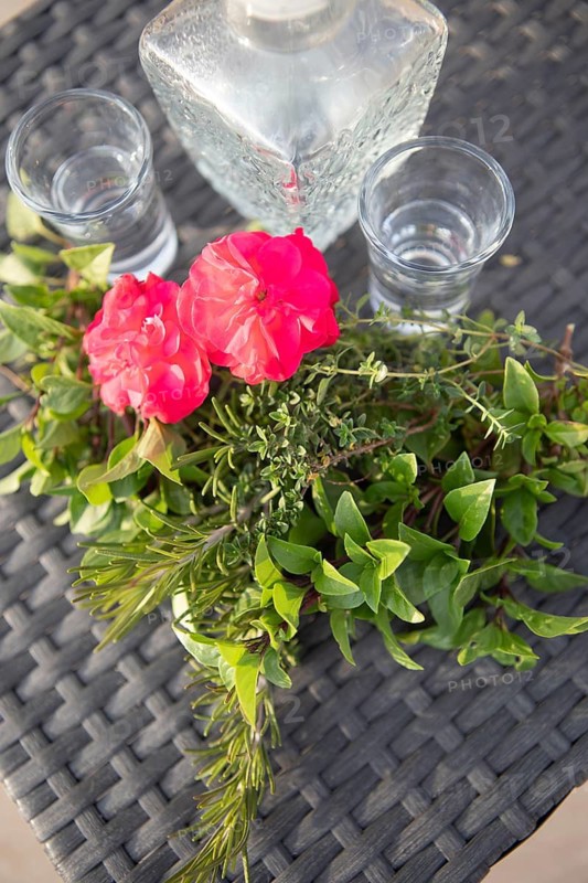 Red hibiscus flower, Greek herbs and raki, Crete, Greece