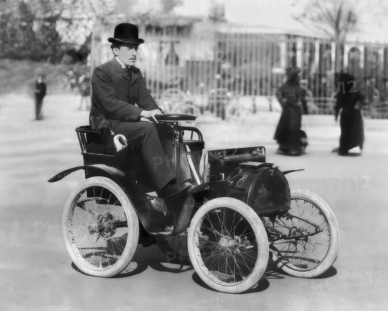 Portrait of Louis Renault, 1877 – 1944, French industrialist, a pioneer of the automobile industry, with his first automobile Renault Voiturette, Type A, 1898, digitally edited based on a historical photograph
