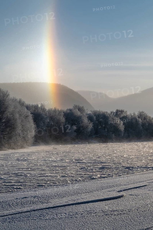 Fog and parhelion over the frozen river Glomma (Glåma), Alvdal, Hedmark, Innlandet, Norway, February 2026