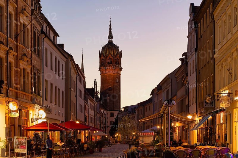 Night view, restaurants, tower, castle tower, castle church, old town, Luther city Wittenberg, evening mood, Saxony-Anhalt, Germany