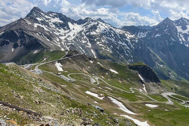 View of serpentines from north ramp north entrance of Grossglockner High Alpine Road Grossglockner High Alpine Road, top left above road loop on Mittertörl, in the background eastern part of the Grossglockner Massif, Fusch, State of Salzburg, Austria