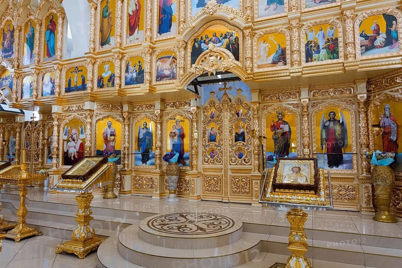 Magnificent icon wall in an Orthodox church with golden decorations and religious paintings, Nicoreni monastery Sf. Ilie, Nicoreni, Drochia, Bessarabia, Republic of Moldova, Moldova